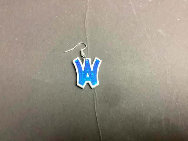 One blue-and-white Wyo Area logo earring; sold as a pair