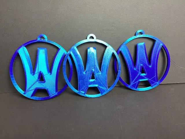 Three single-color blue Wyo Area logo ornaments